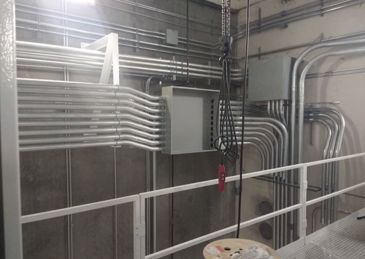 Extensive parallel electrical raceway installation in an industrial facility